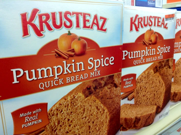 a row of display boxes for pumpkin spice bread
