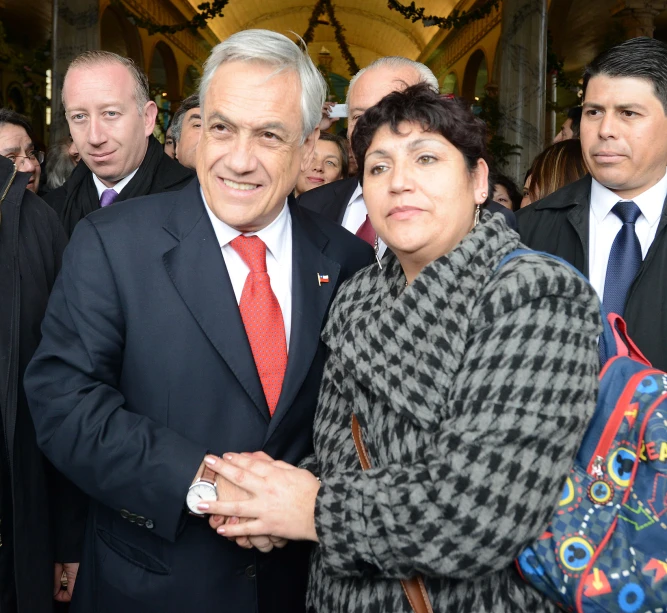 a man and a woman are posing for a po