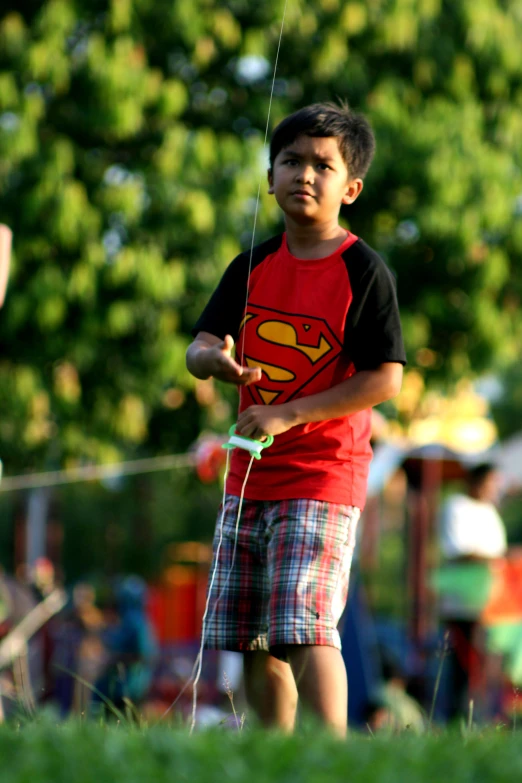  flying kite outside during summertime