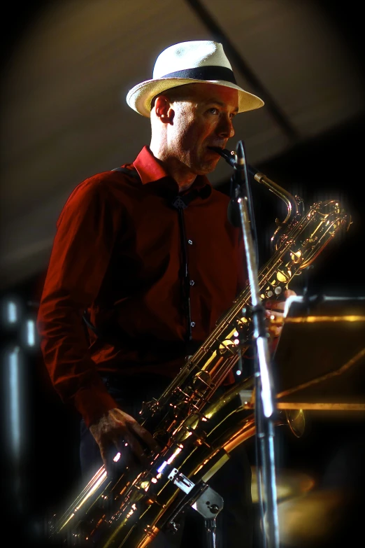 an image of man playing a saxophone
