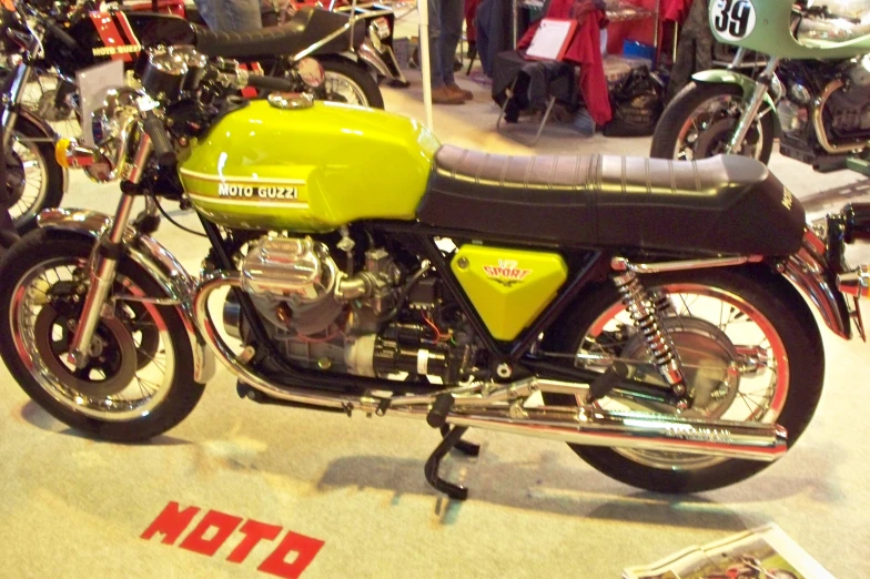 a motorcycle is on display at a show