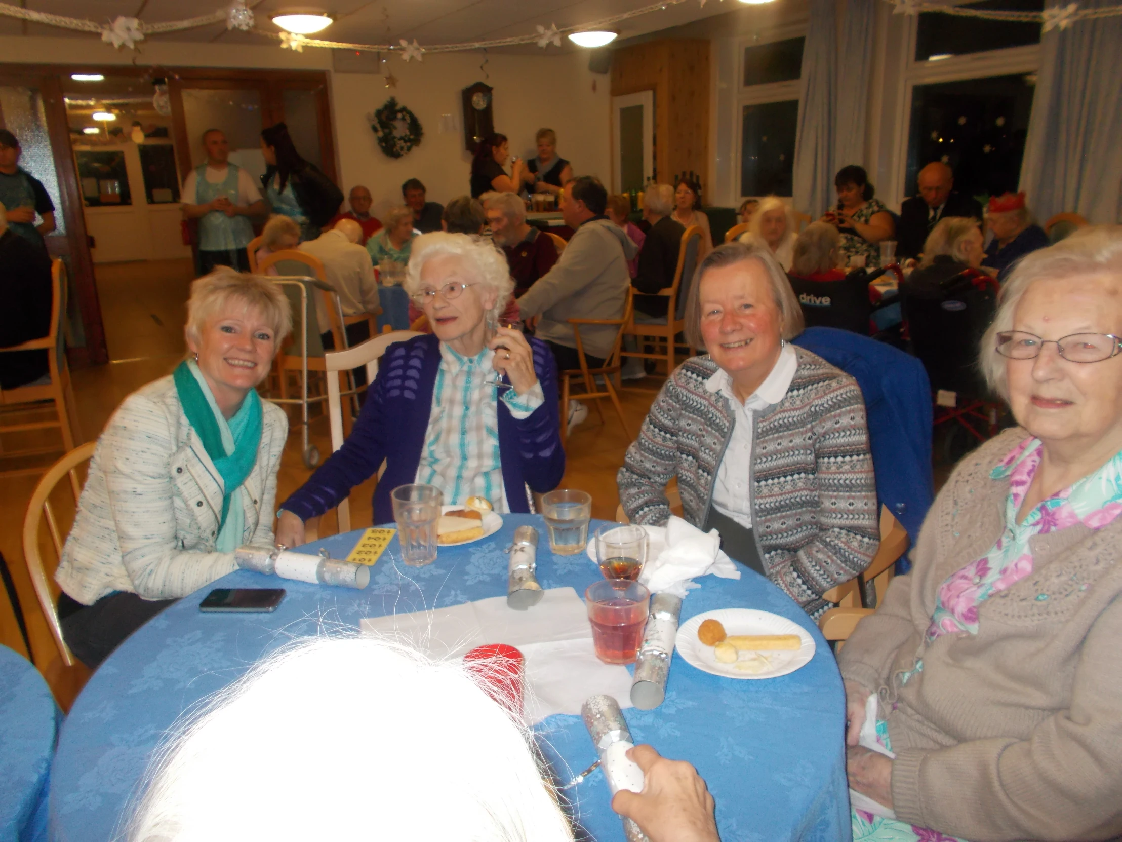 a group of people sitting around a table