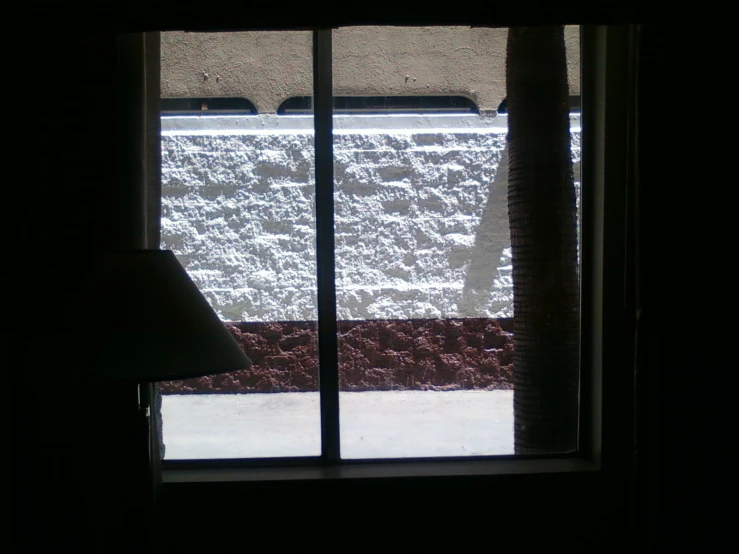 a window that has the view out in the snow