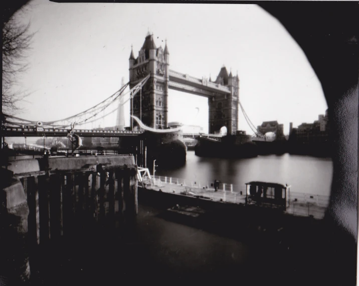 an image of an old po of the tower bridge