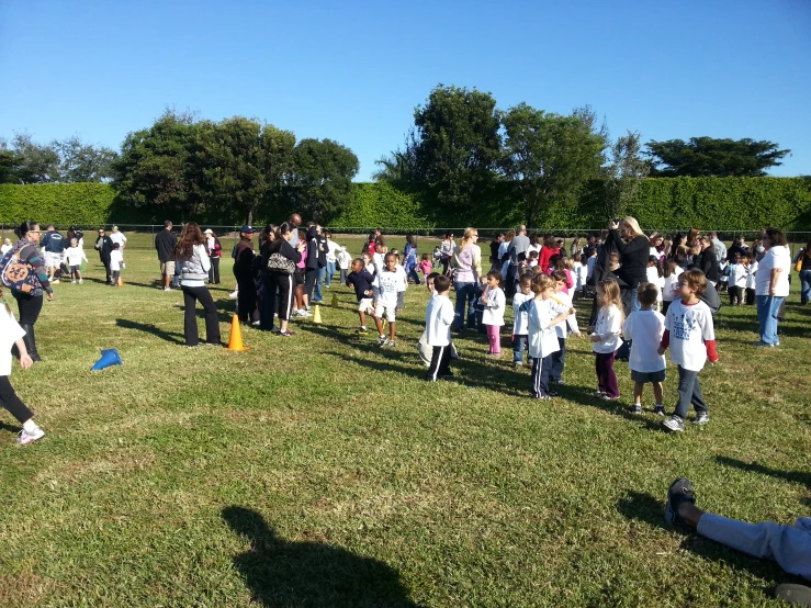 a group of children standing next to each other