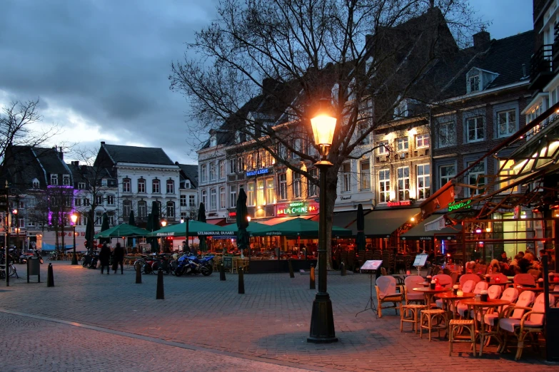 the busy street area is lit up for night