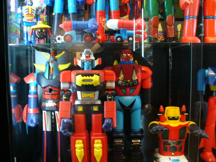 a display case filled with different types of toys
