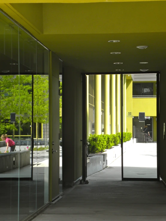 an image of glass doors on a hallway