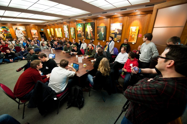 several people sitting around a conference table