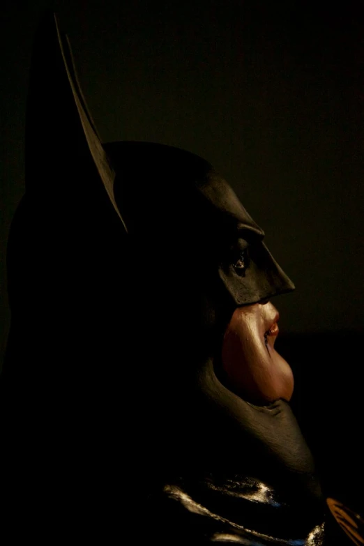 a batman with the man's nose hanging out