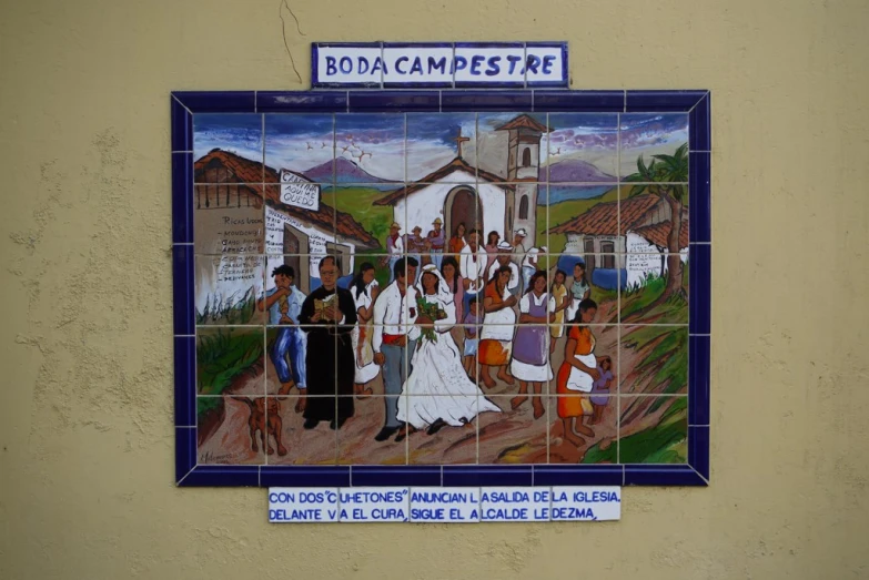 a tile mural of a village scene is featured