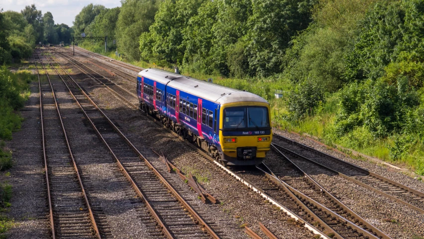 there is a train moving on the tracks