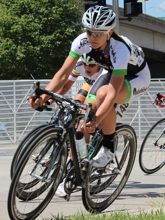 a man that is riding on the back of a bike