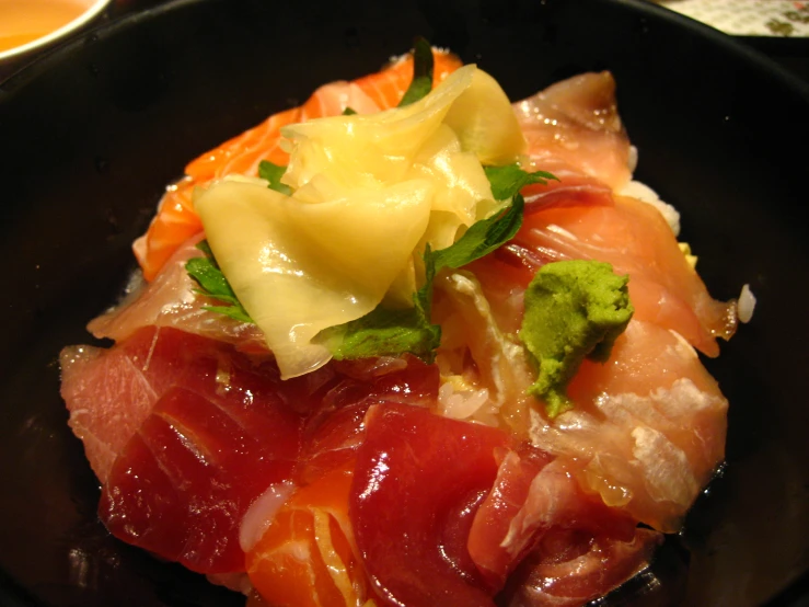 a large piece of meat is sitting in a bowl