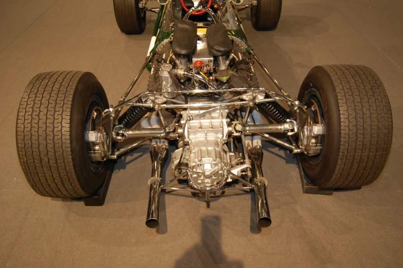 a race car with the engine on display