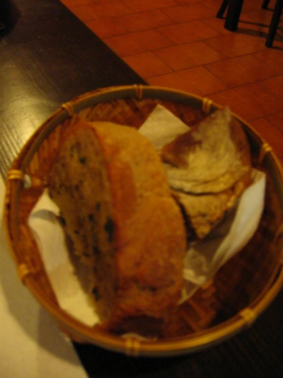 a bread basket containing two slices of bread