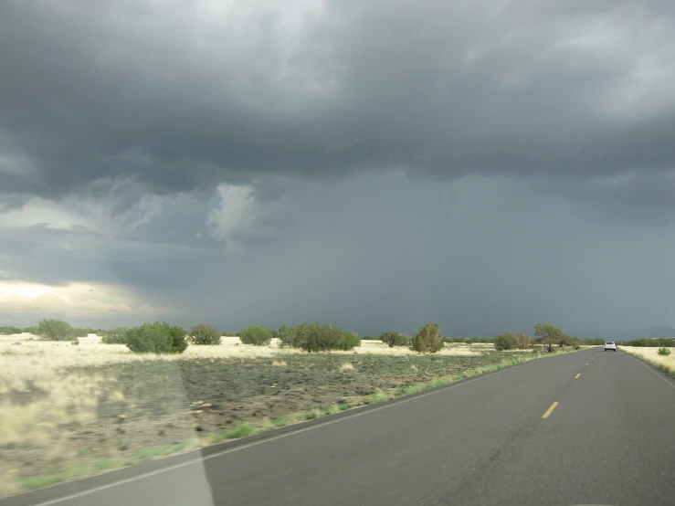 the interior view of an approaching vehicle on the road