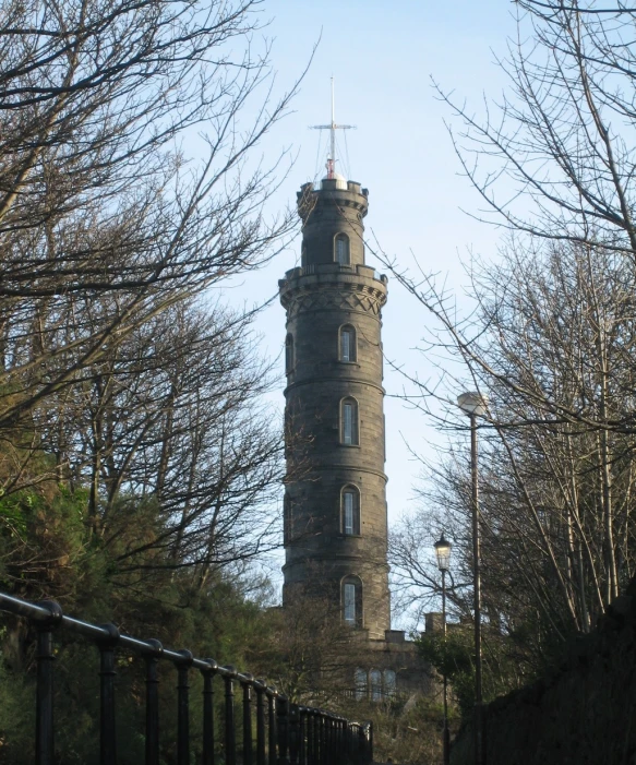 the tall tower has several windows at each end