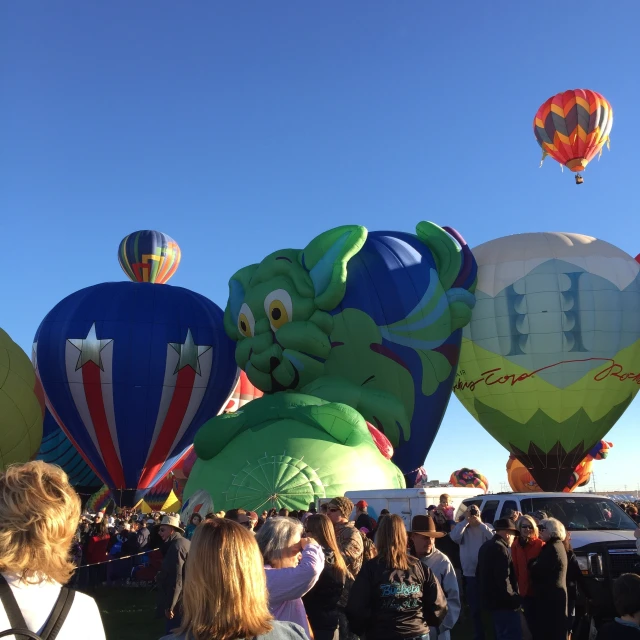 an elaborate floater of balloons at a balloon festival