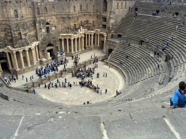 a huge roman theater has seating for audience