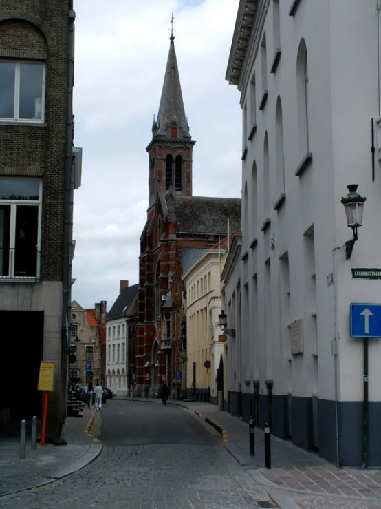 a street lined with buildings and tall towers