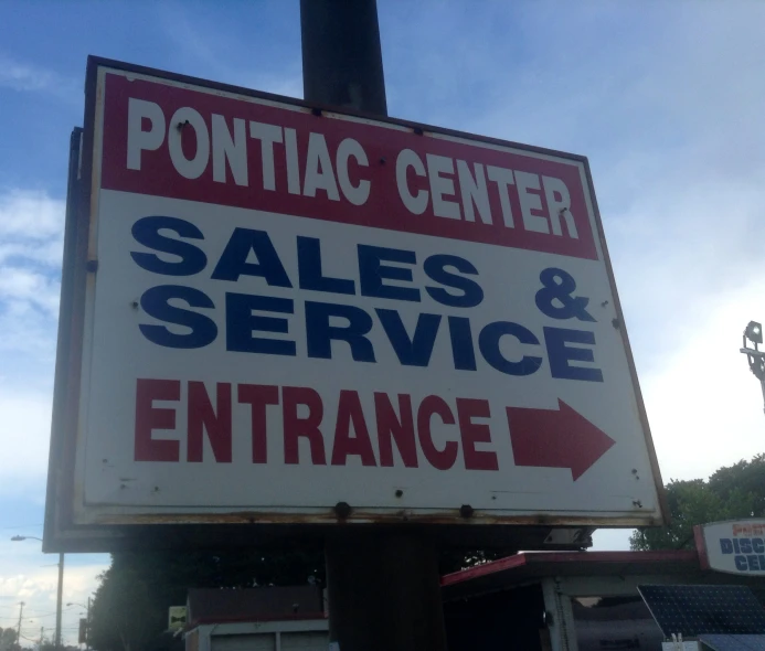 the sign says sales and service entrance