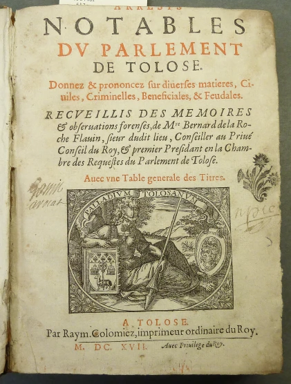 an old book with a medieval title on the front page