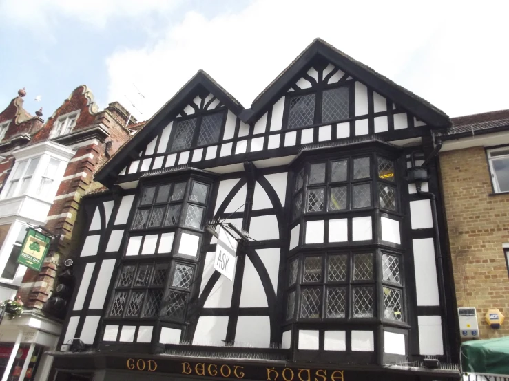 an old building has a black and white exterior