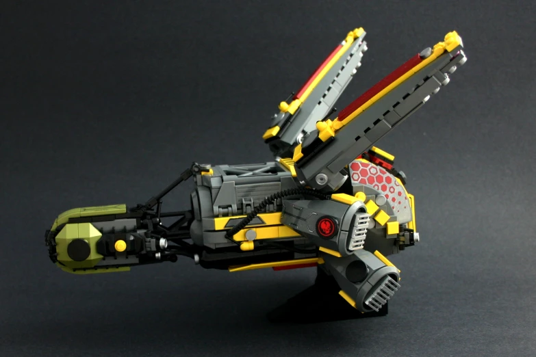 a model of a lego gun that resembles a flying robot