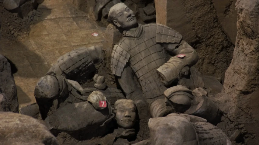 a po of a group of statues in a cave