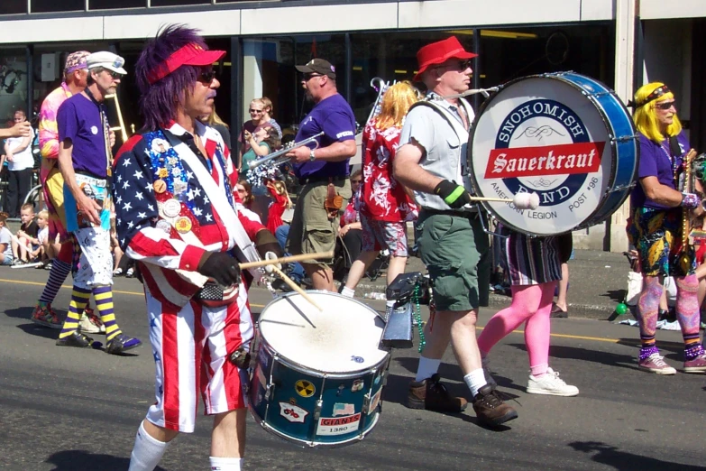 a large group of people walking down the street