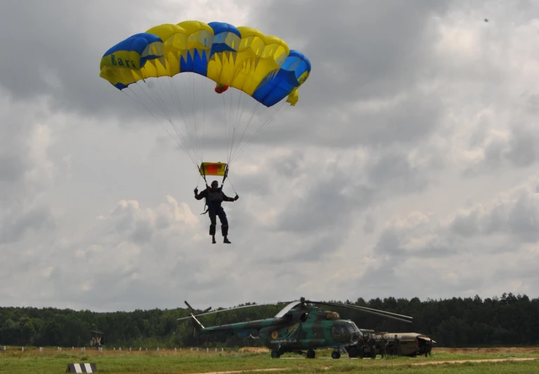 a man on an air plane is being parachuting