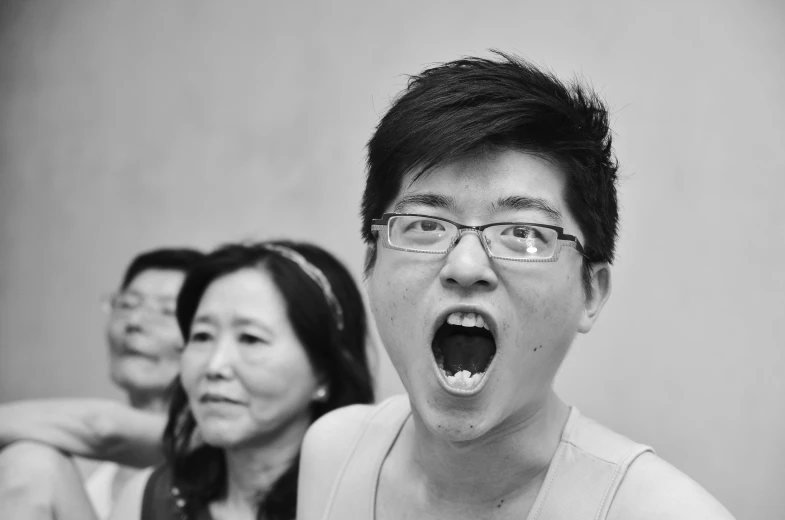 black and white pograph of an asian women yelling