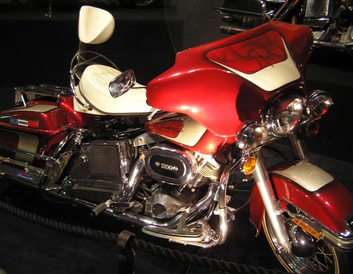 a motorcycle on display at a car show