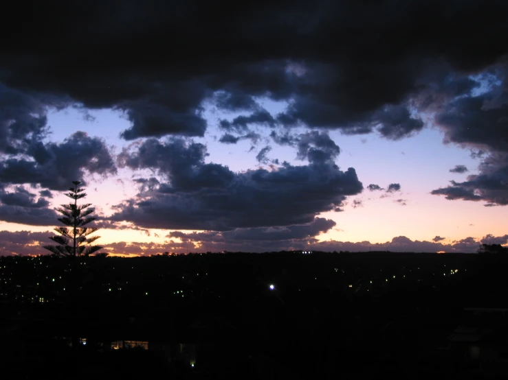 some clouds that are in the sky with lights