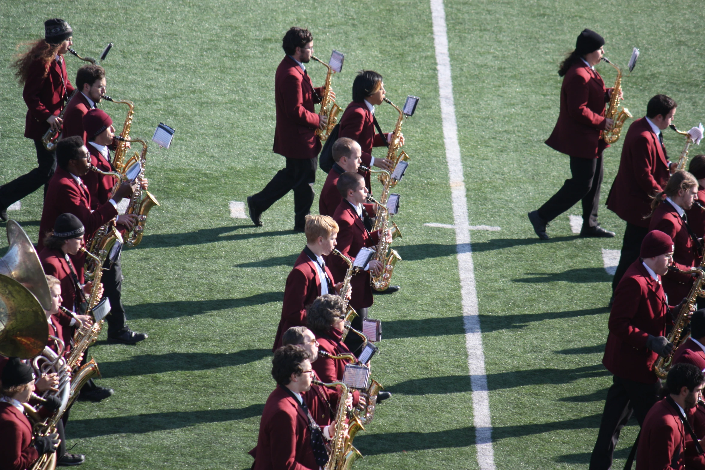 band marching on a field during a competition