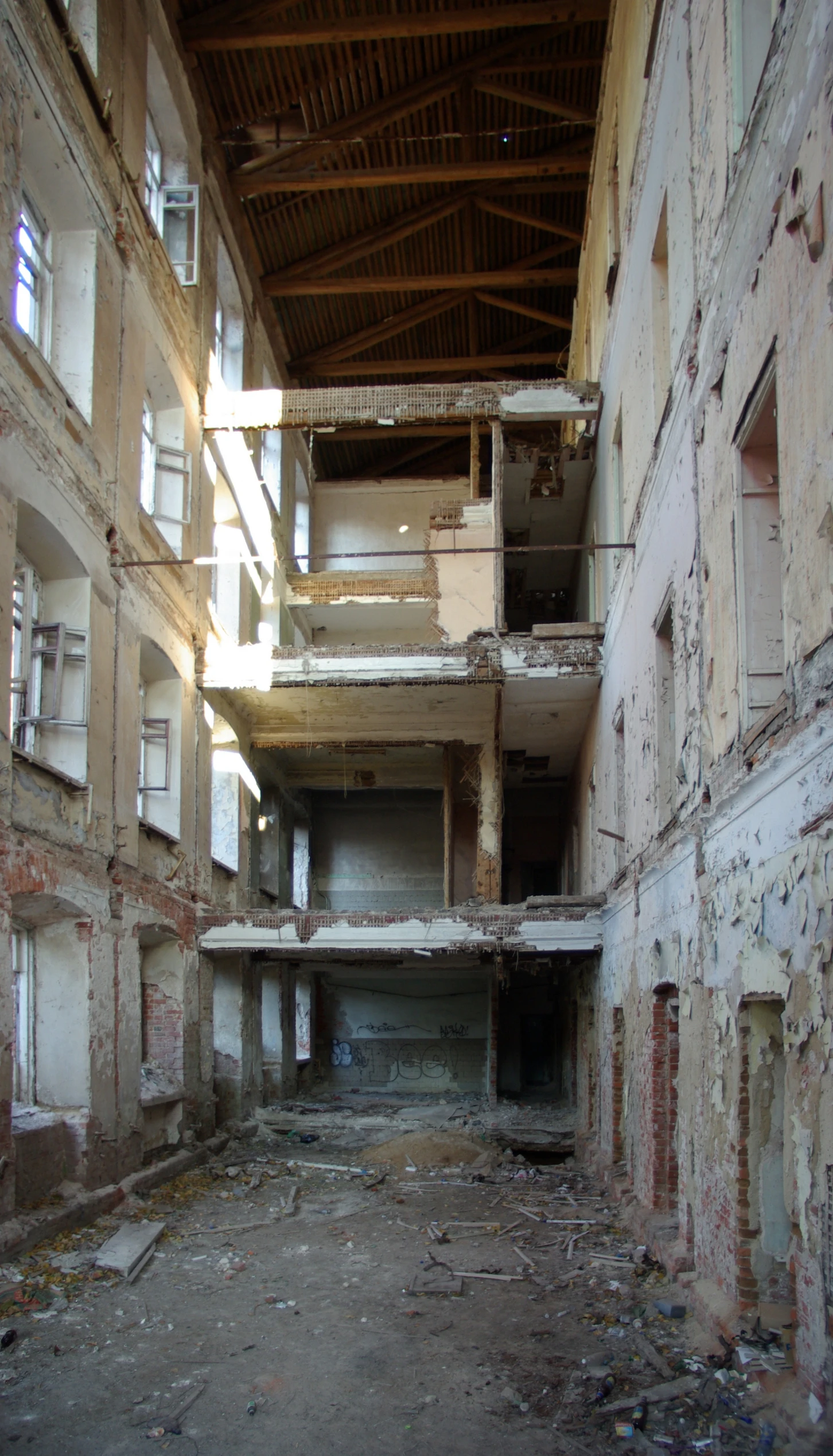 an unfinished apartment building has a spiral staircase