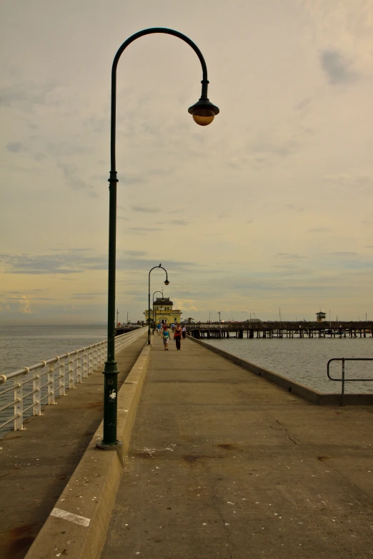a street light near the edge of a pier