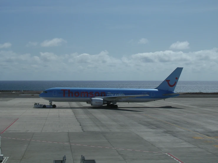 there is a large airplane that is parked on the runway