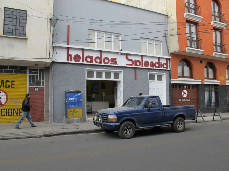 an suv parked in front of a store