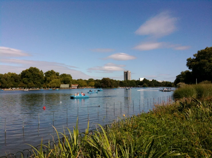 a river that has boats in the water