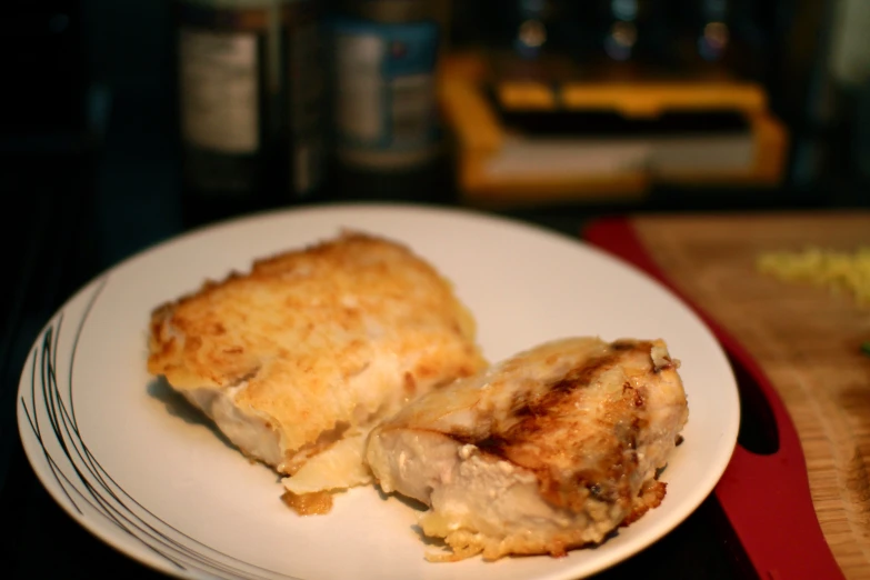 a white plate topped with food and fried meat