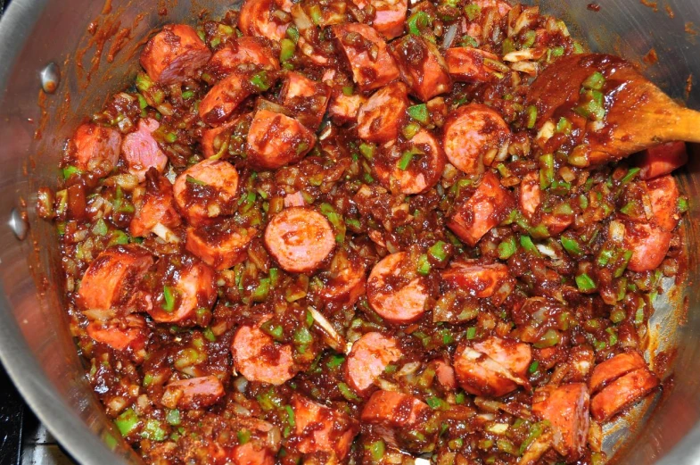 a pot full of food sitting on a stove