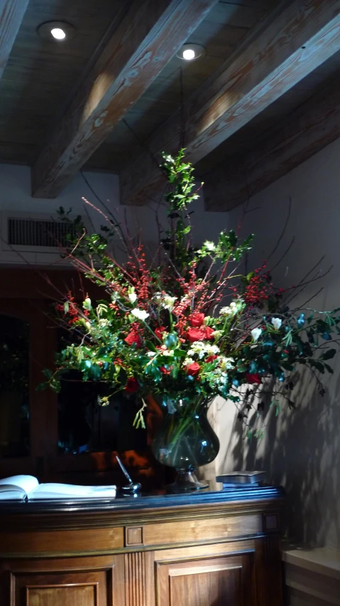 a vase of flowers sitting on a table