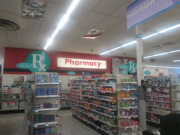 pharmacy products are shown inside a store in the day