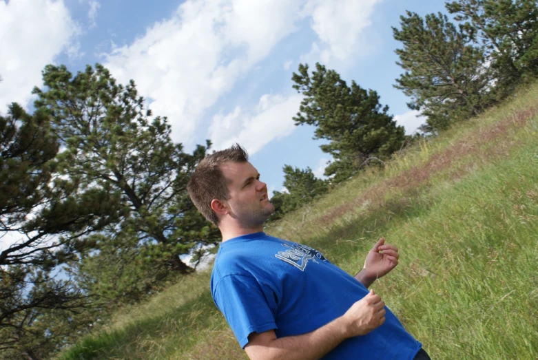 a man that is flying a kite in the sky