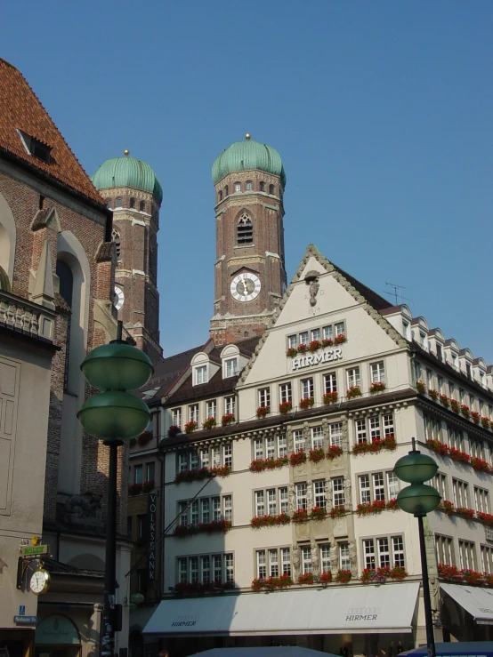 two large buildings sit on the opposite side of each other