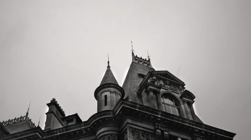 the steeple of a gothic style building is shown