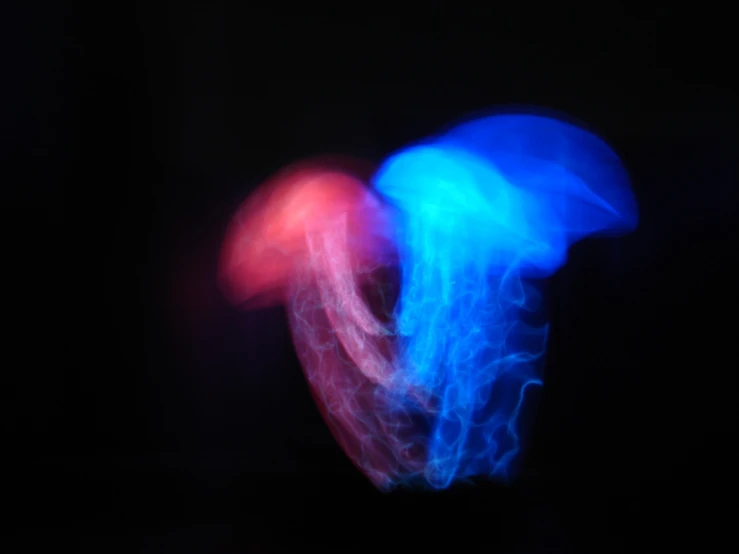 red and blue objects are lit up in the dark