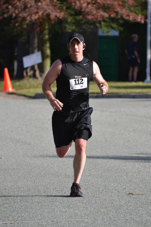 a man is running a marathon on the street